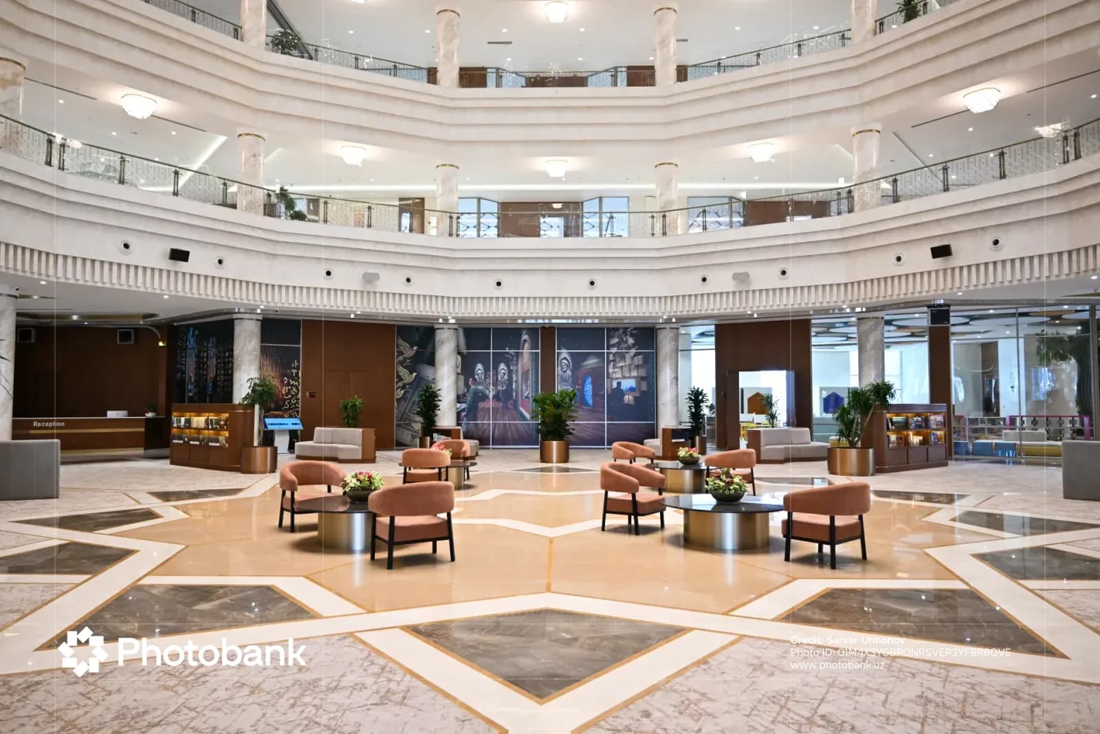 Spacious multi-level interior hall with seating areas