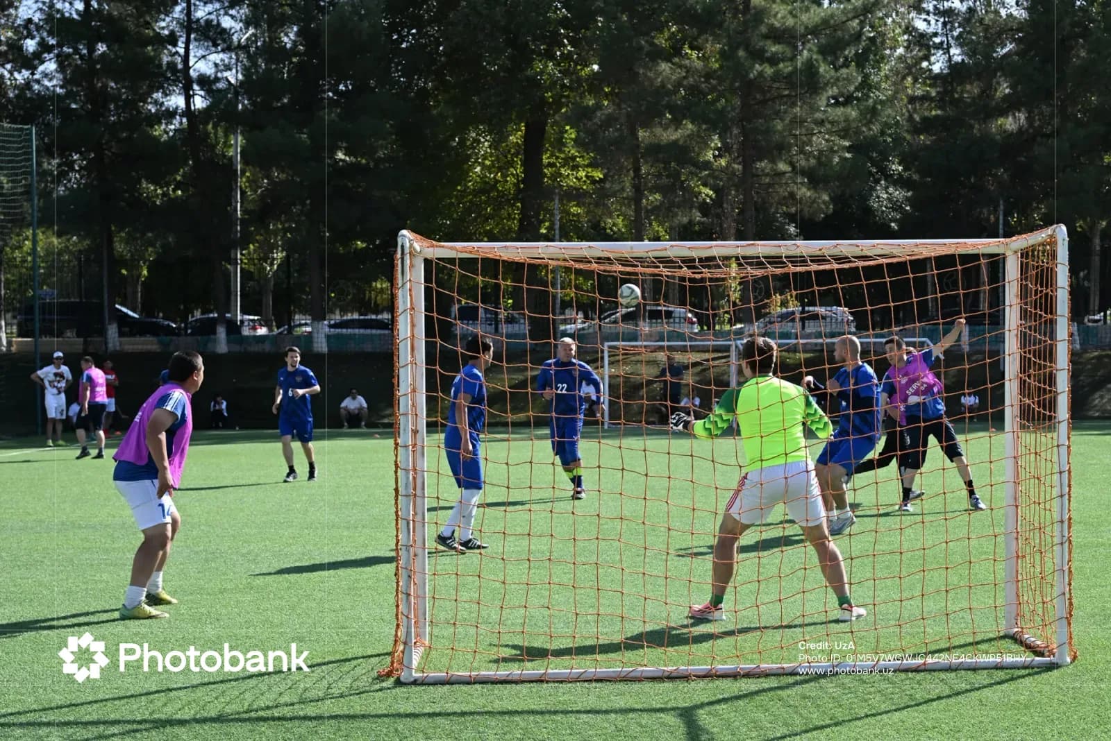 Players on a soccer field during a match