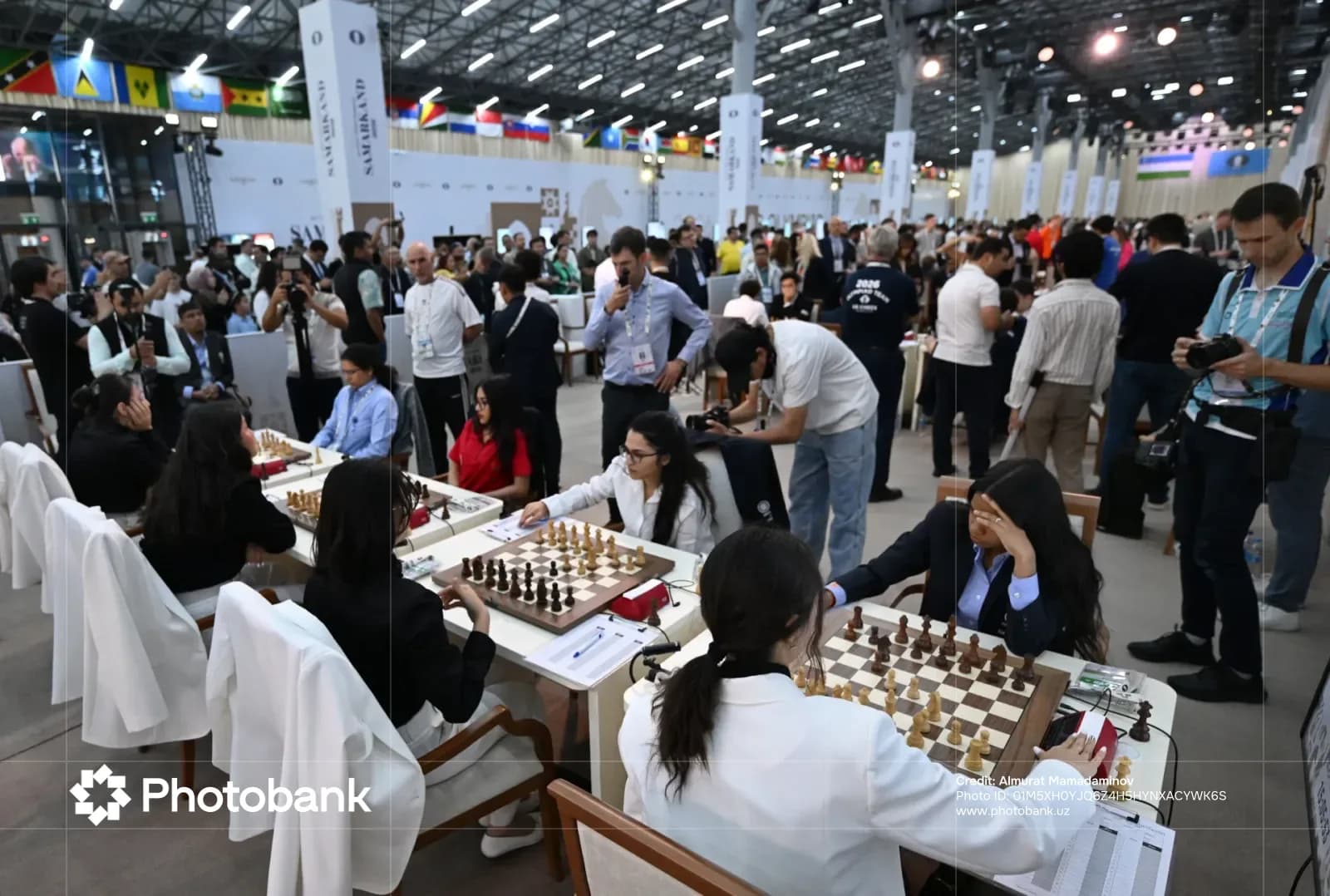 People playing chess during an indoor competition