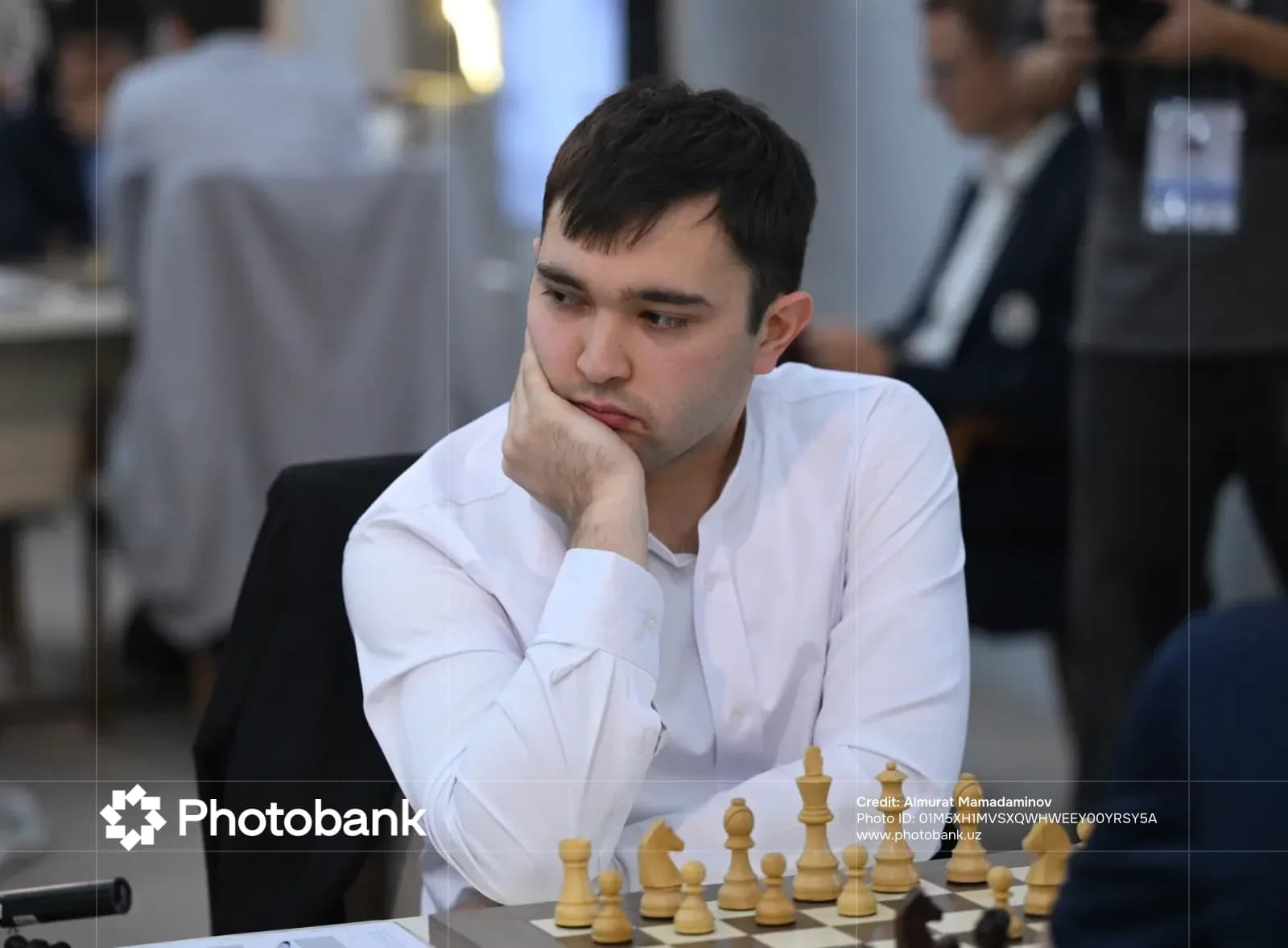 Person playing chess during a tournament