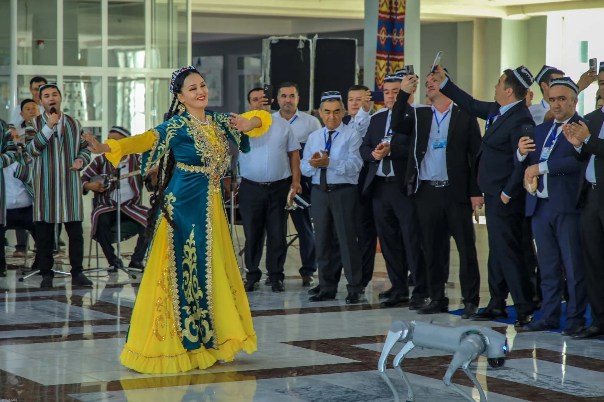 Woman performing a traditional dance indoors