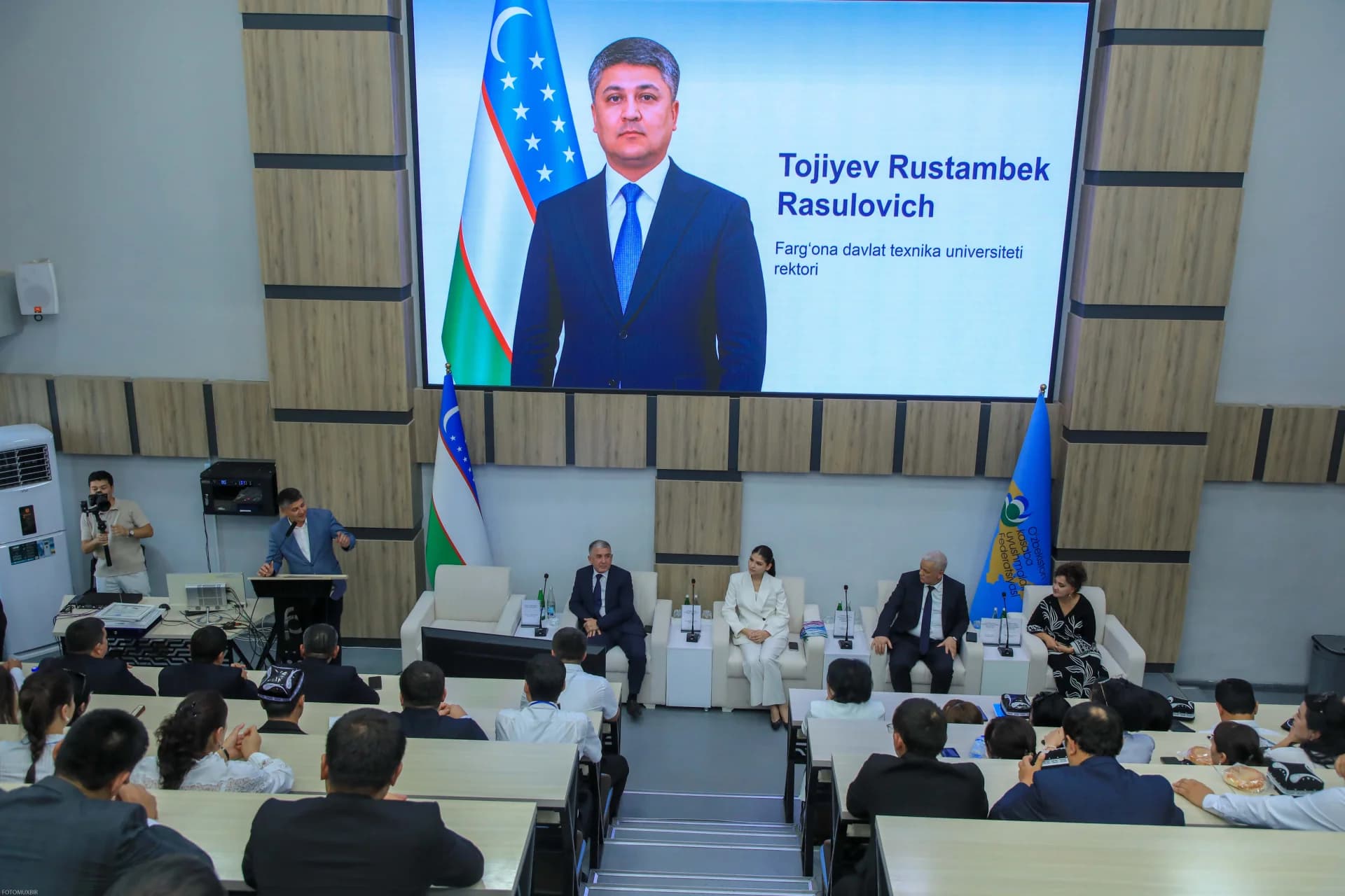 Conference presentation in an auditorium