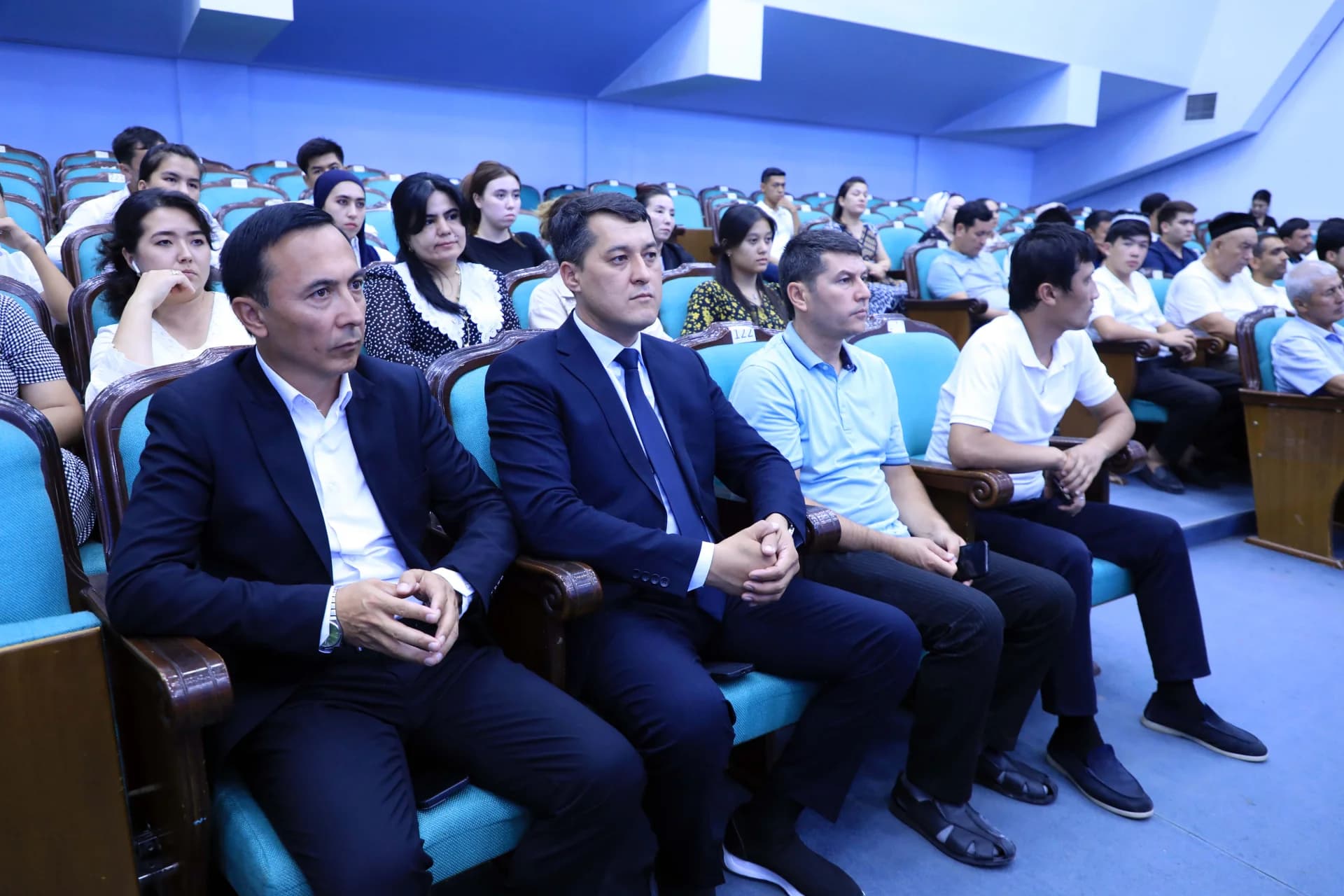 People sitting in a conference hall