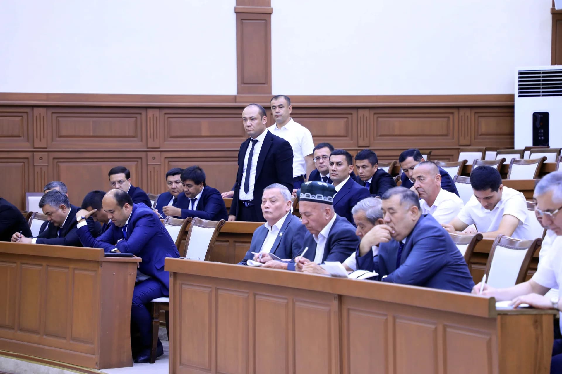 People gathered in a conference hall
