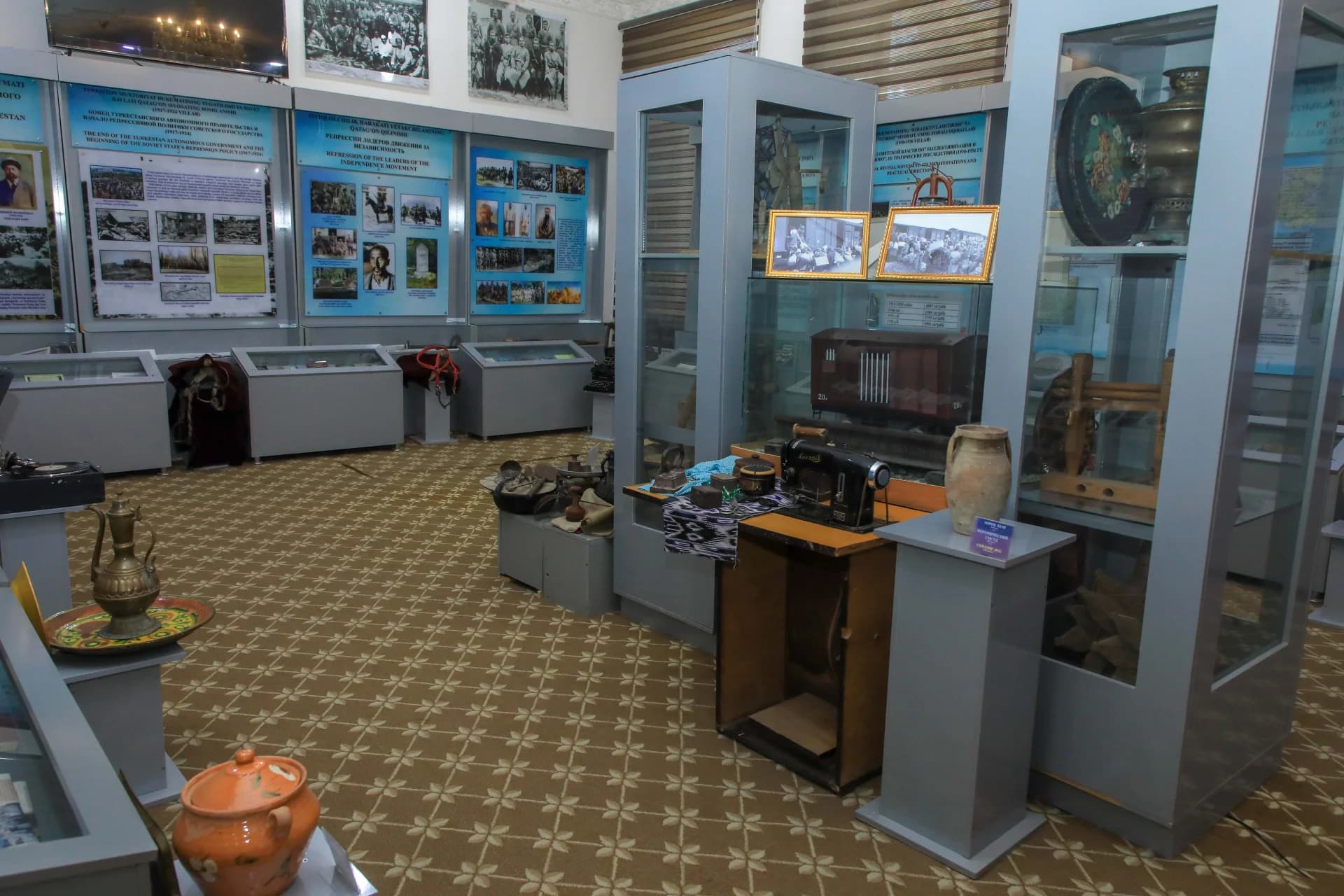 Historical exhibition interior with display cases and artifacts in a museum