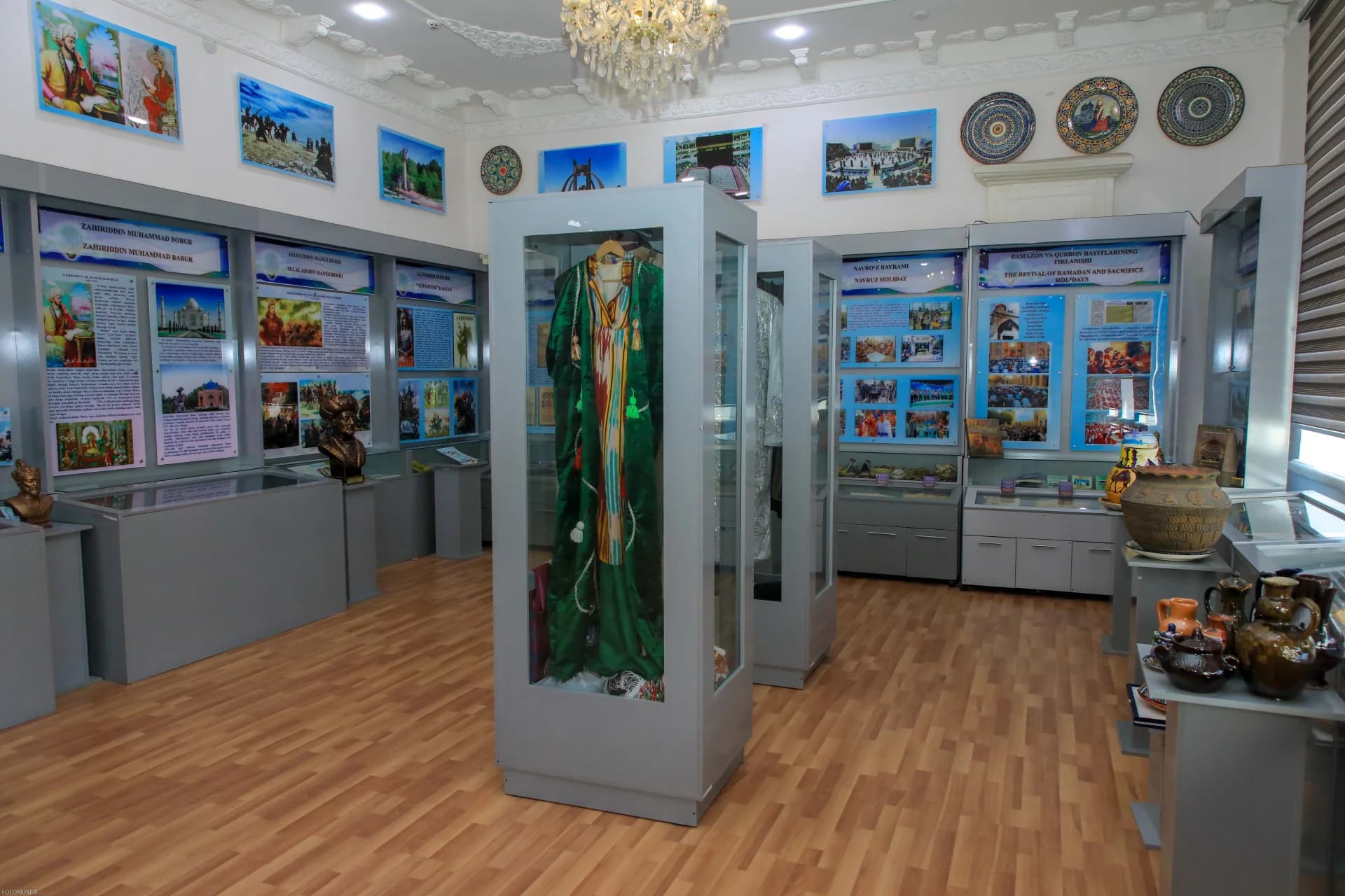 Exhibition hall with display cases and historical exhibits in a museum