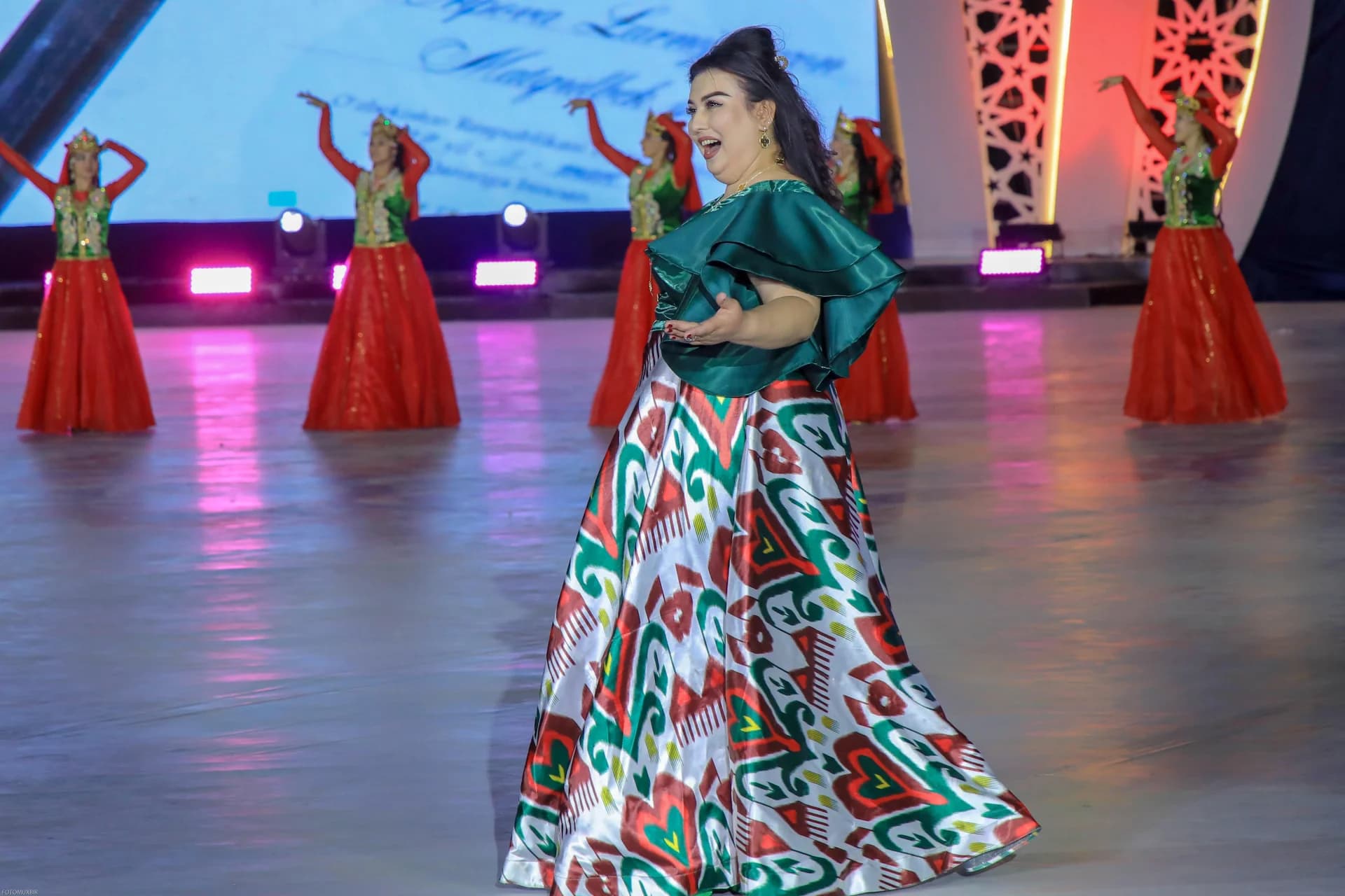 Performers dancing on stage