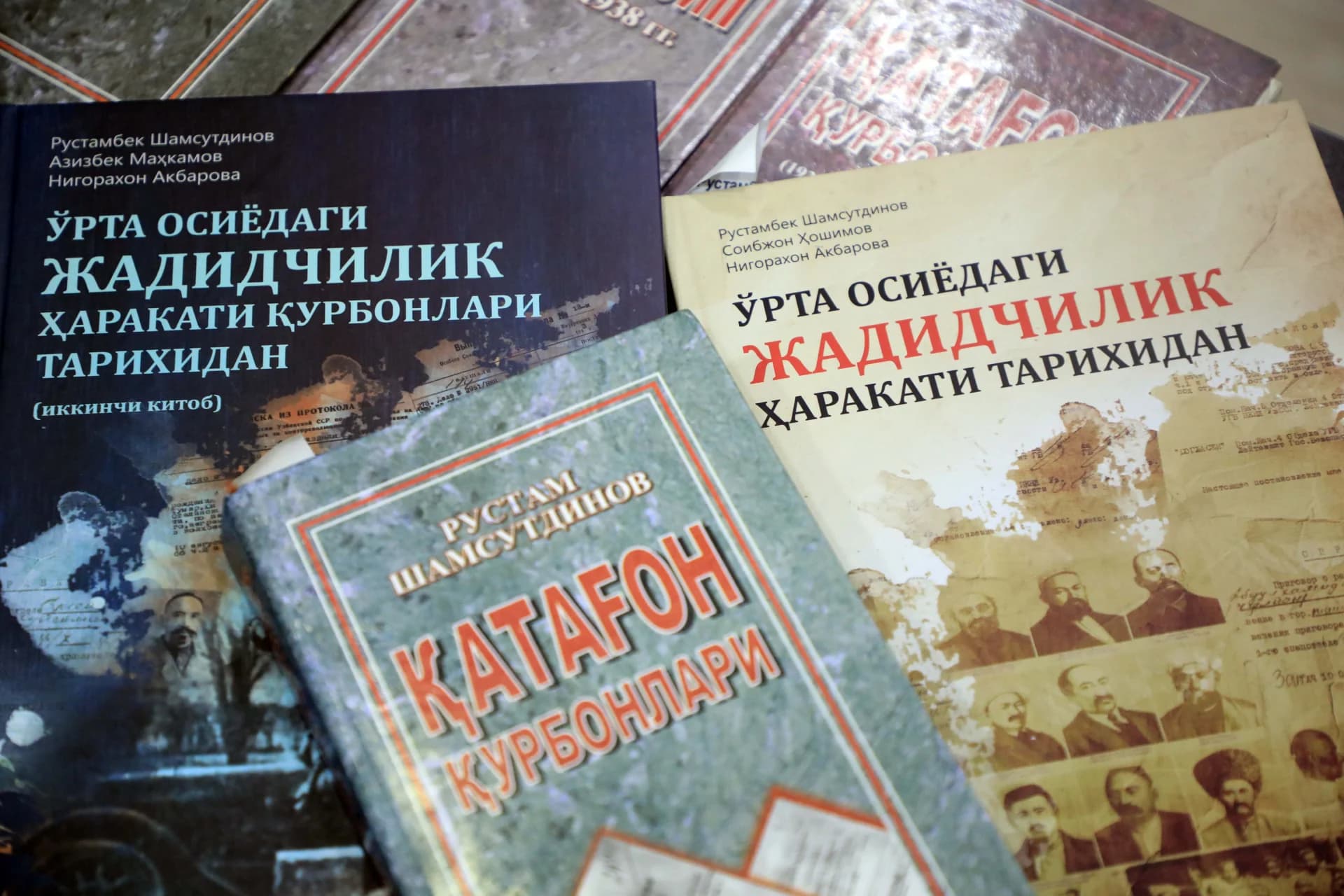Several books with Cyrillic titles are arranged together