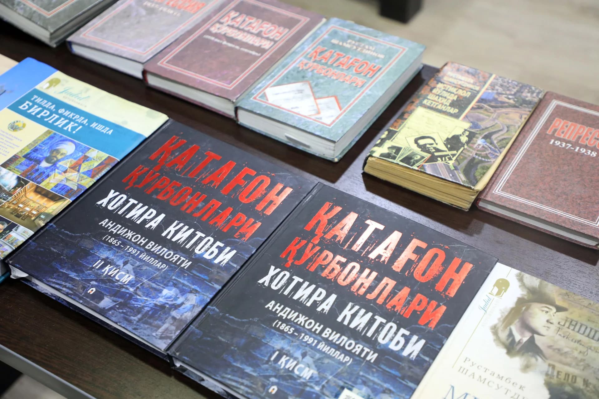 Various books displayed on a flat surface