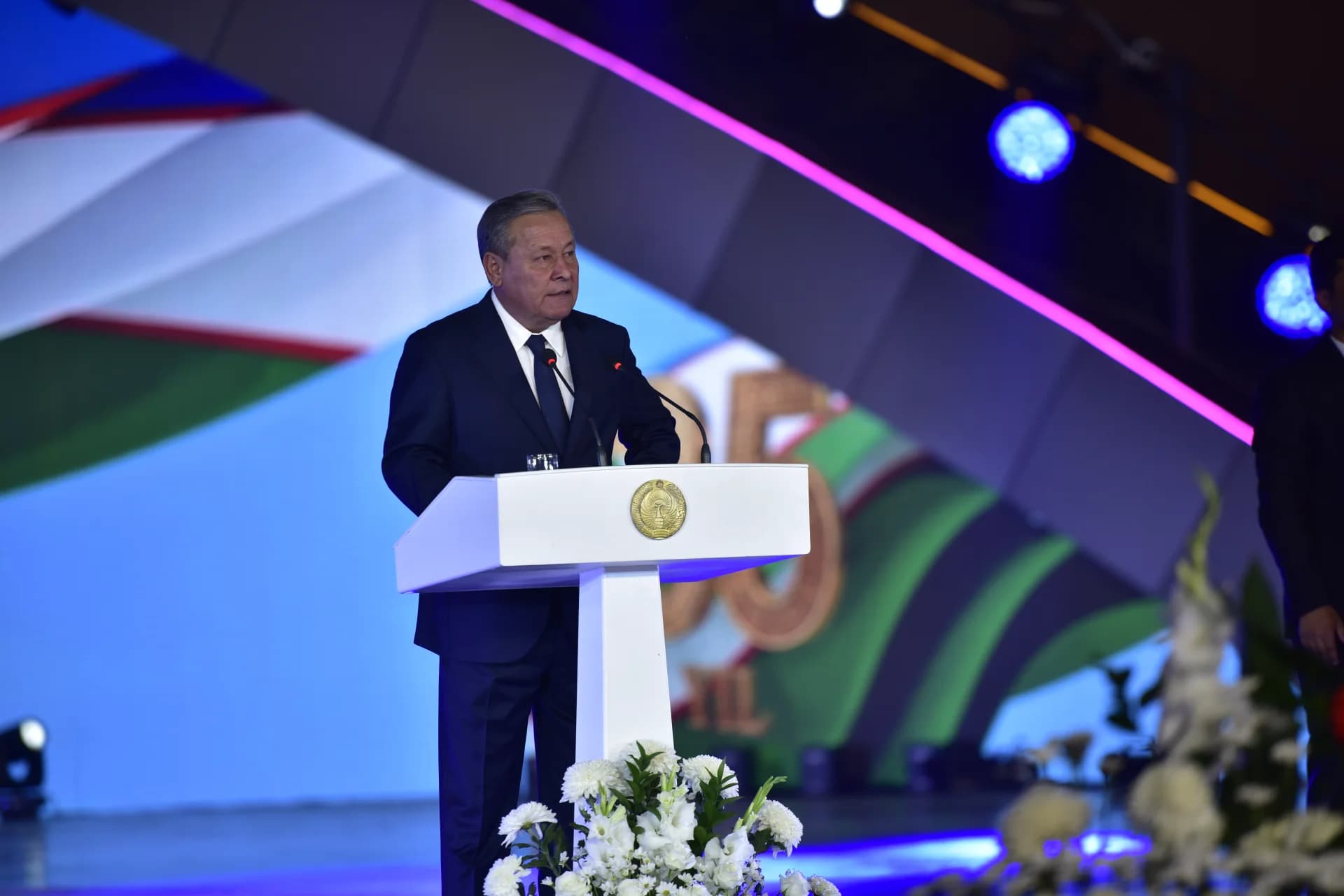 Leader speaking at a podium