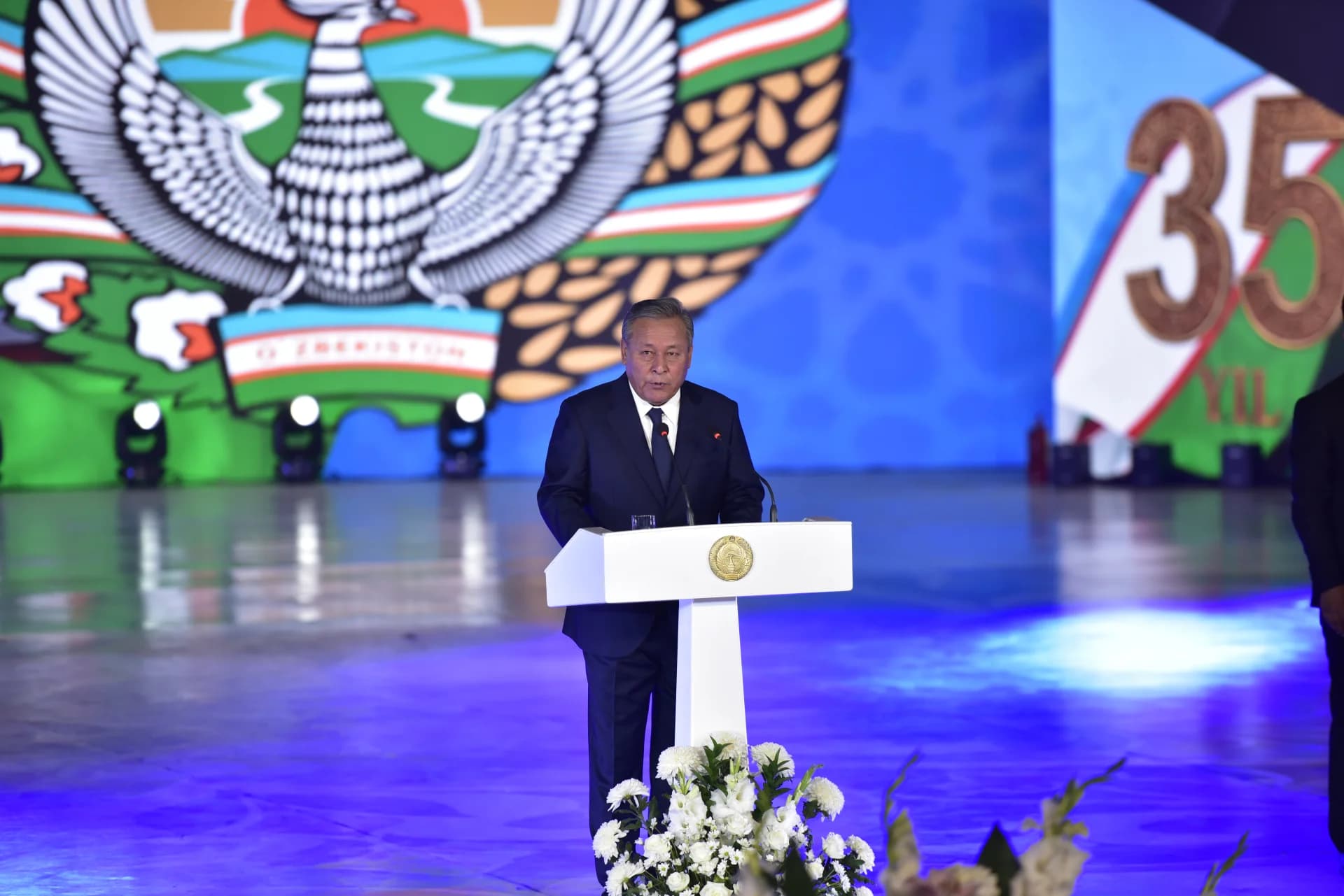 Man speaking at a podium