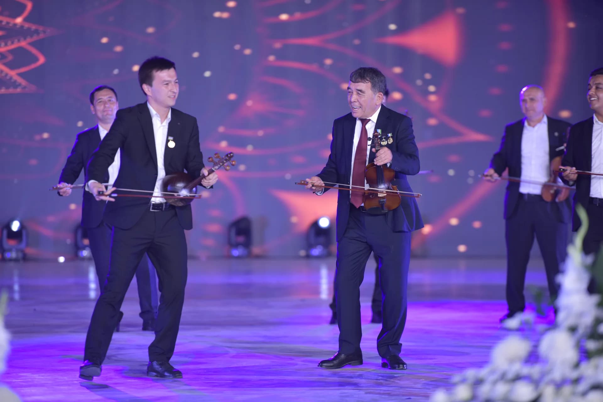 People performing music on stage