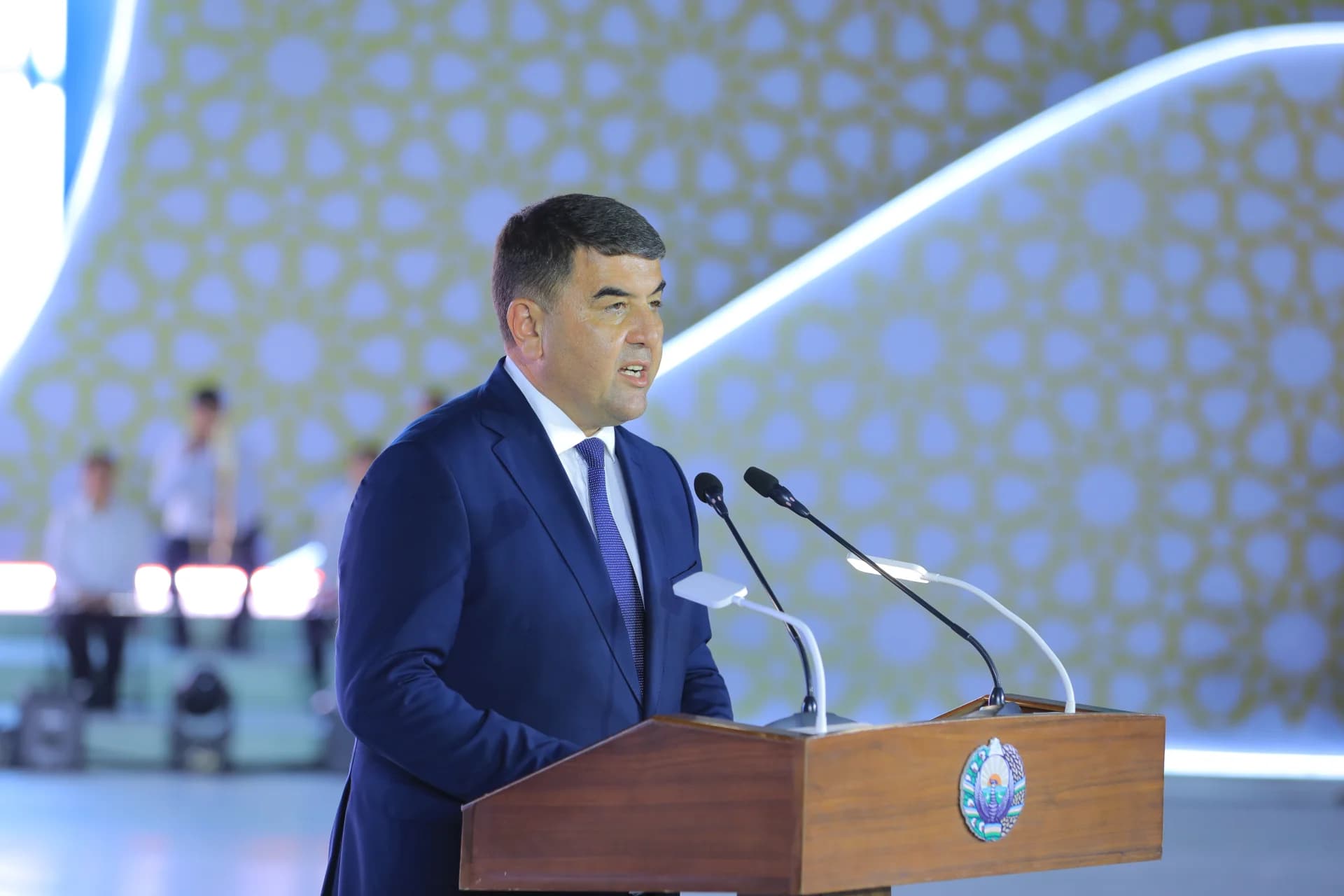 Man speaking at a podium