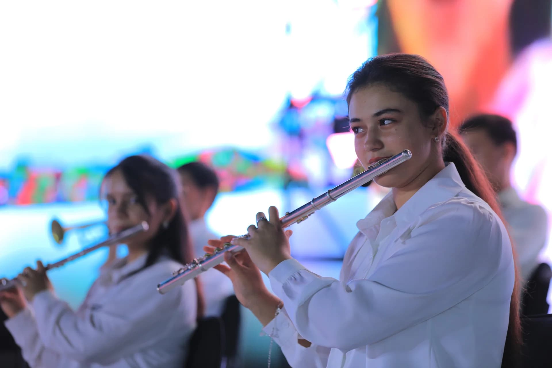Young people playing musical instruments