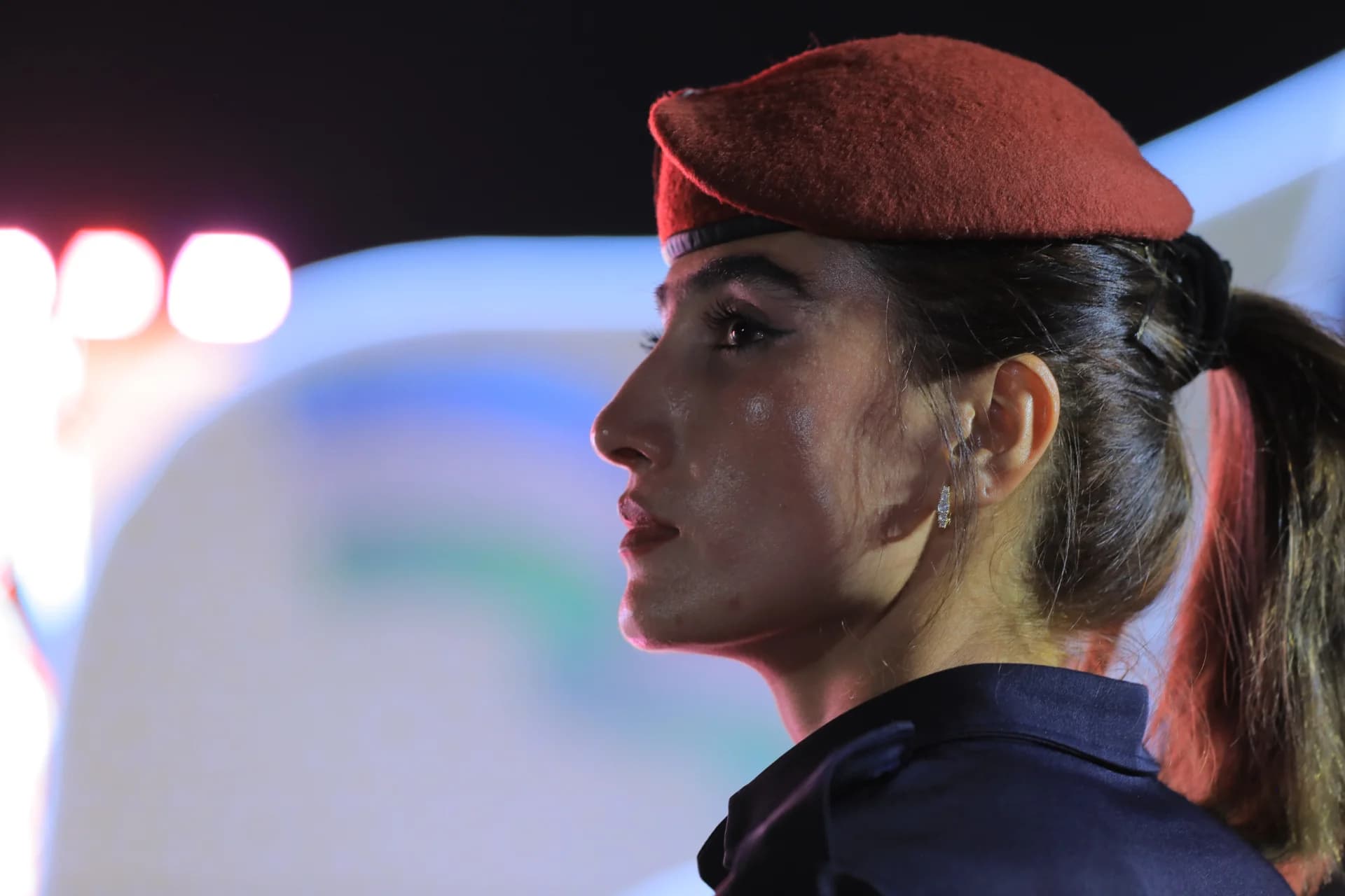 Portrait of a person in a red beret