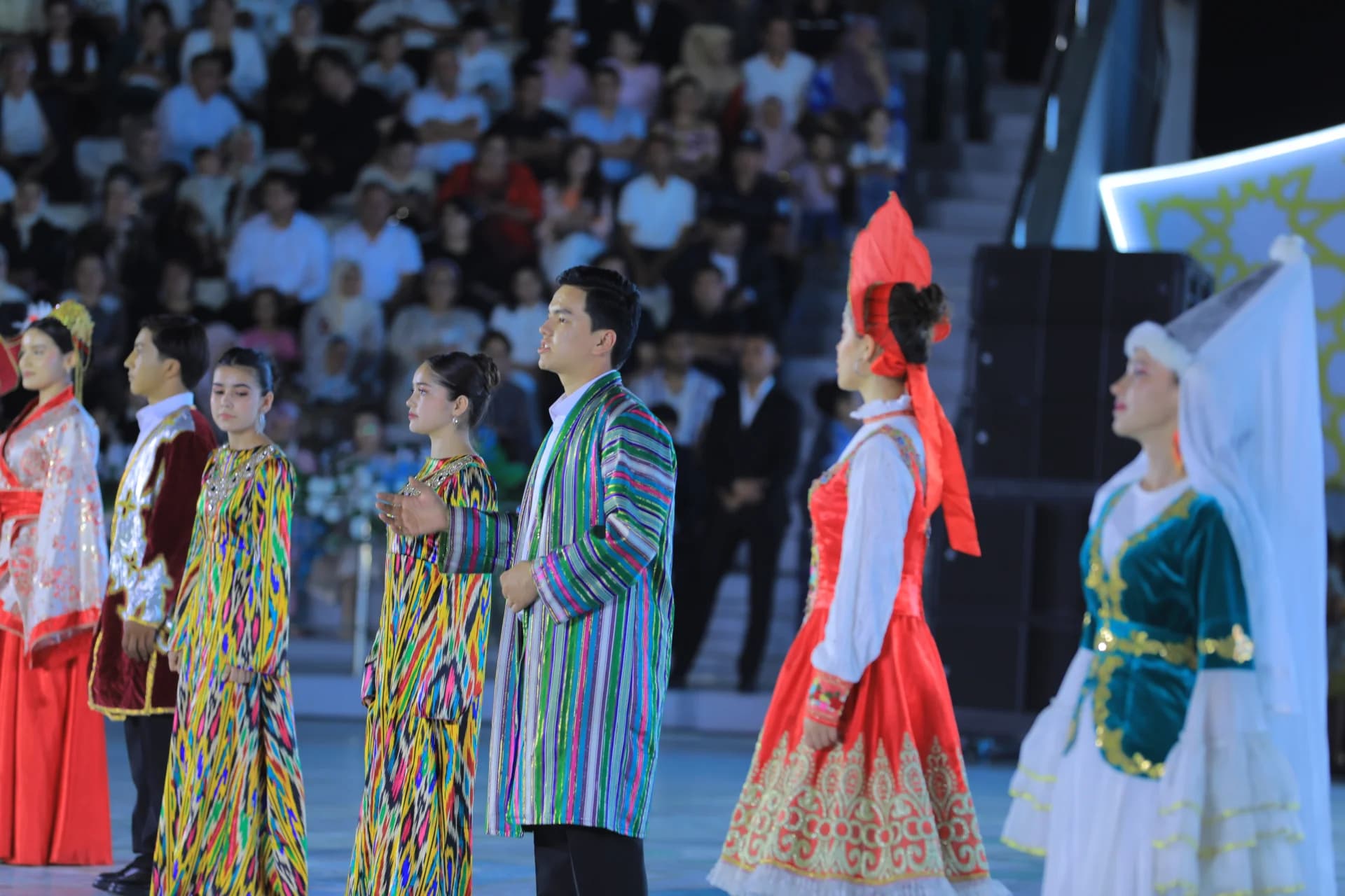 People in traditional clothing during a cultural performance