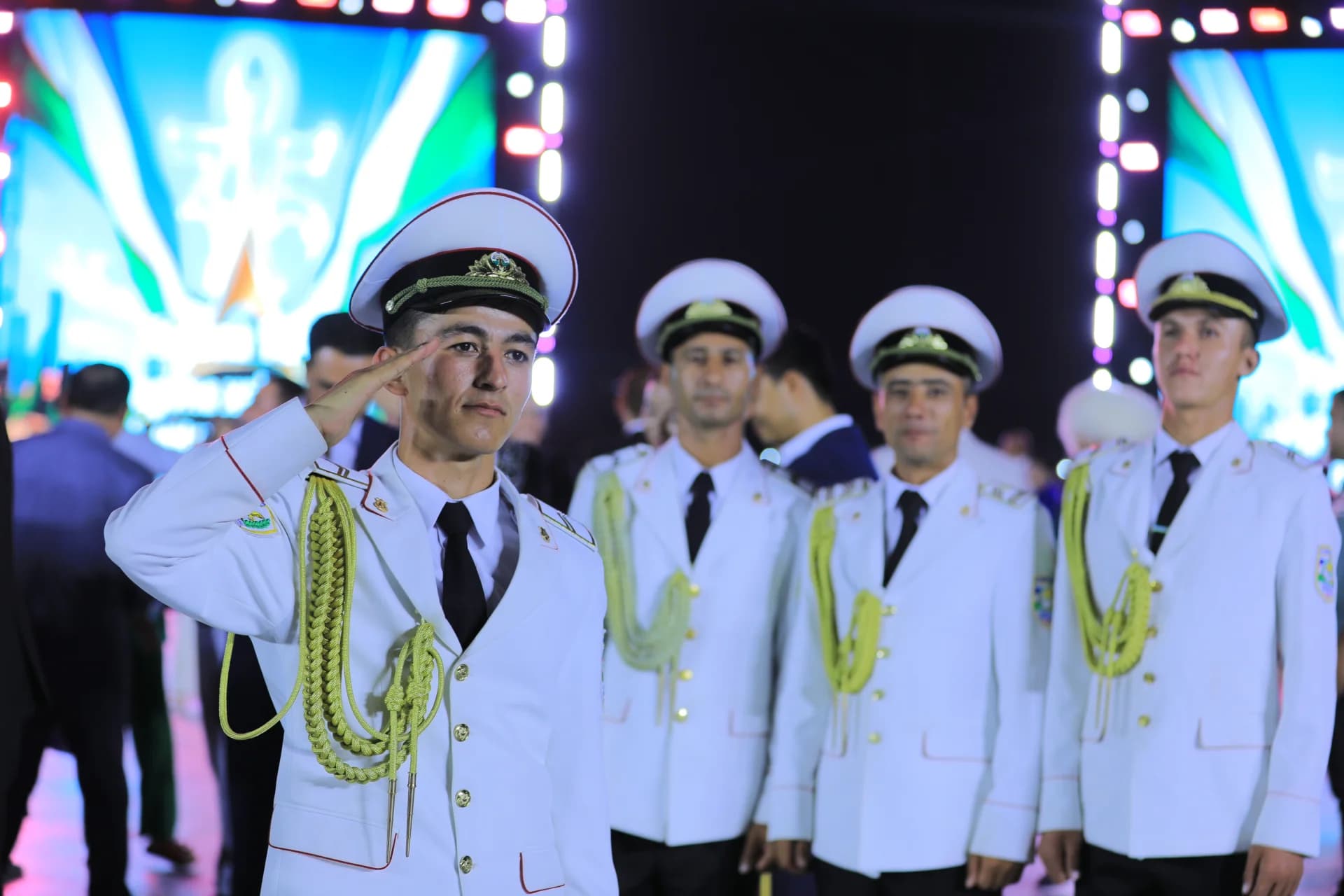 Men in uniform saluting