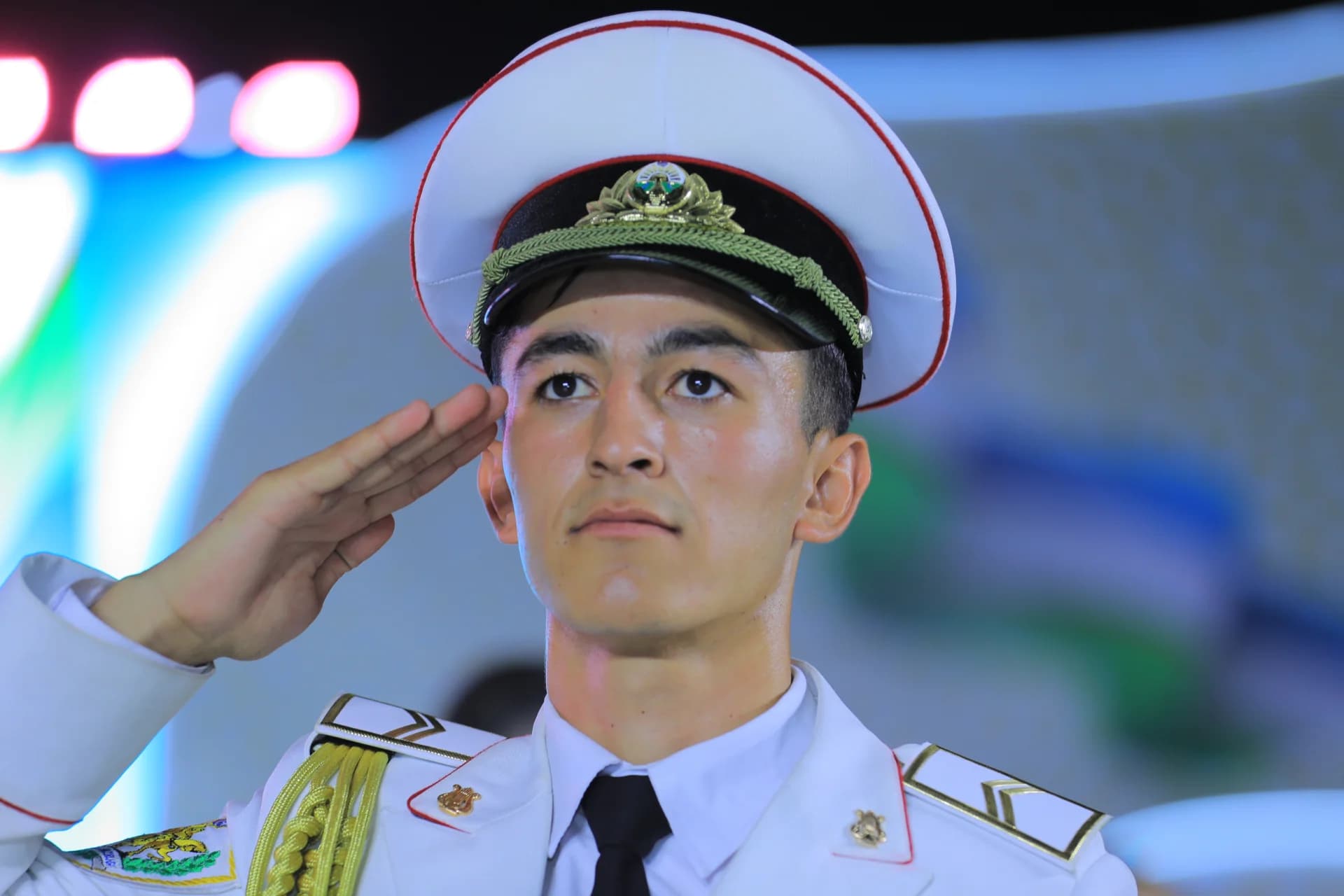 Person in uniform saluting