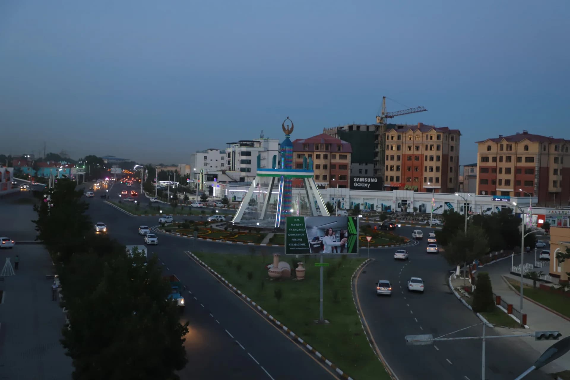 City street traffic and architecture during twilight