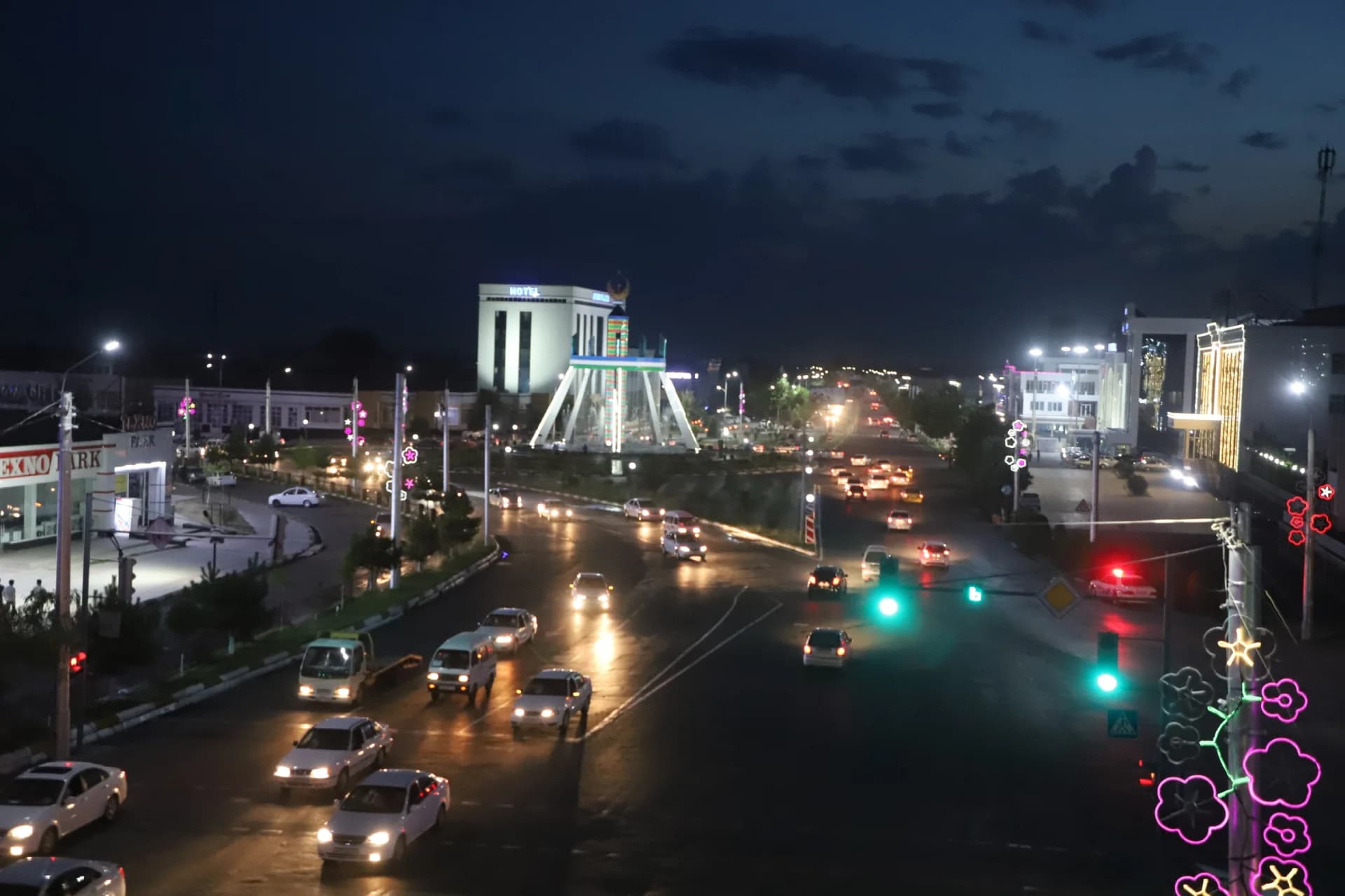 Night cityscape with moving traffic and illuminated street lights