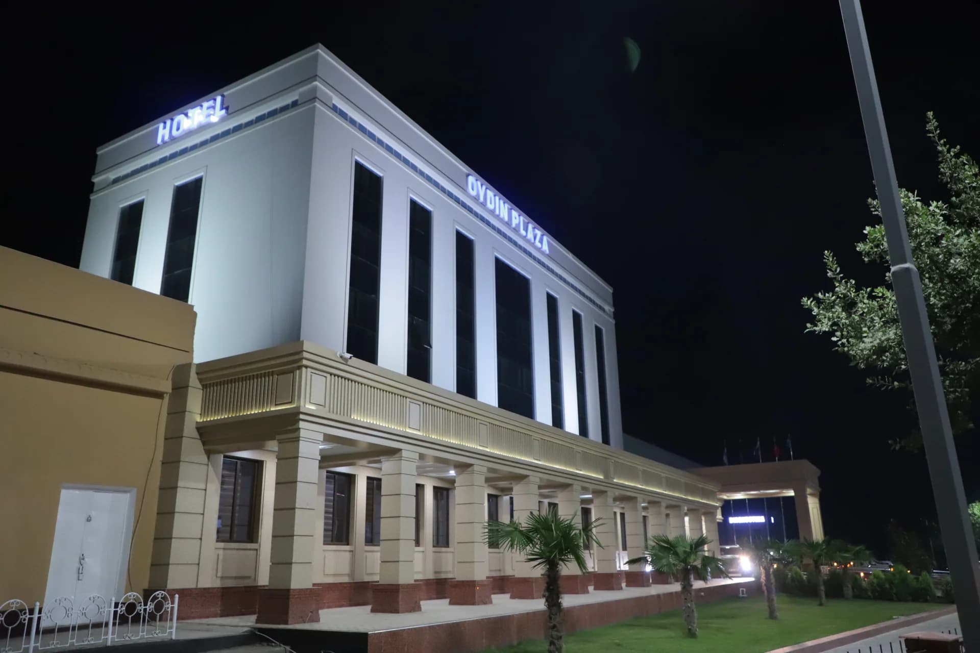 Illuminated modern hotel building at night