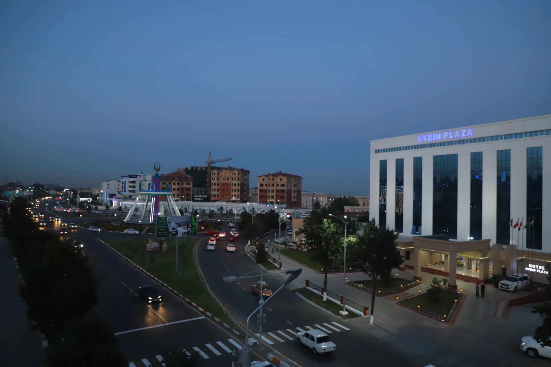 City street and modern buildings at dusk