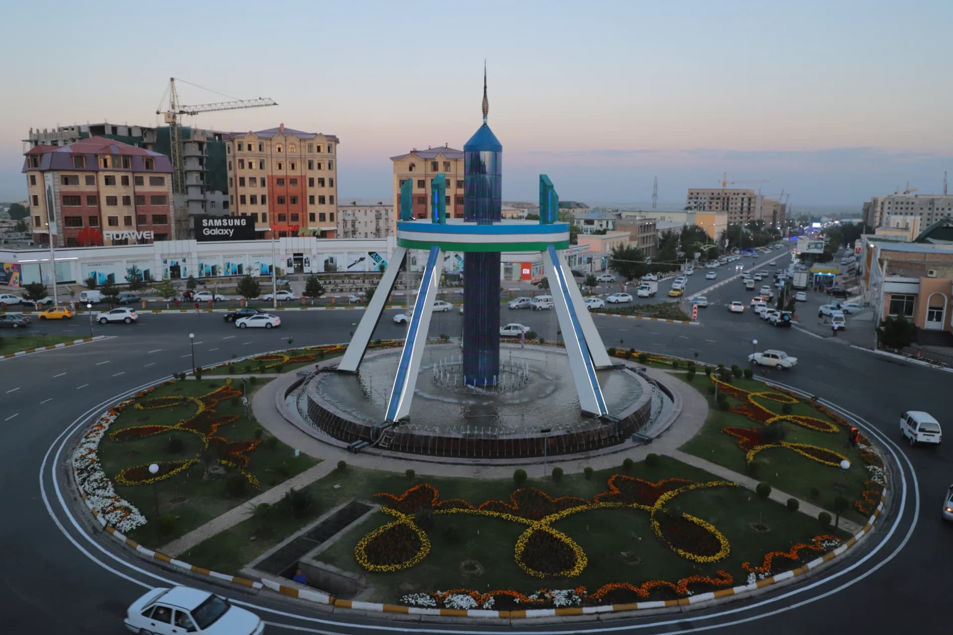 City roundabout with a fountain and monument