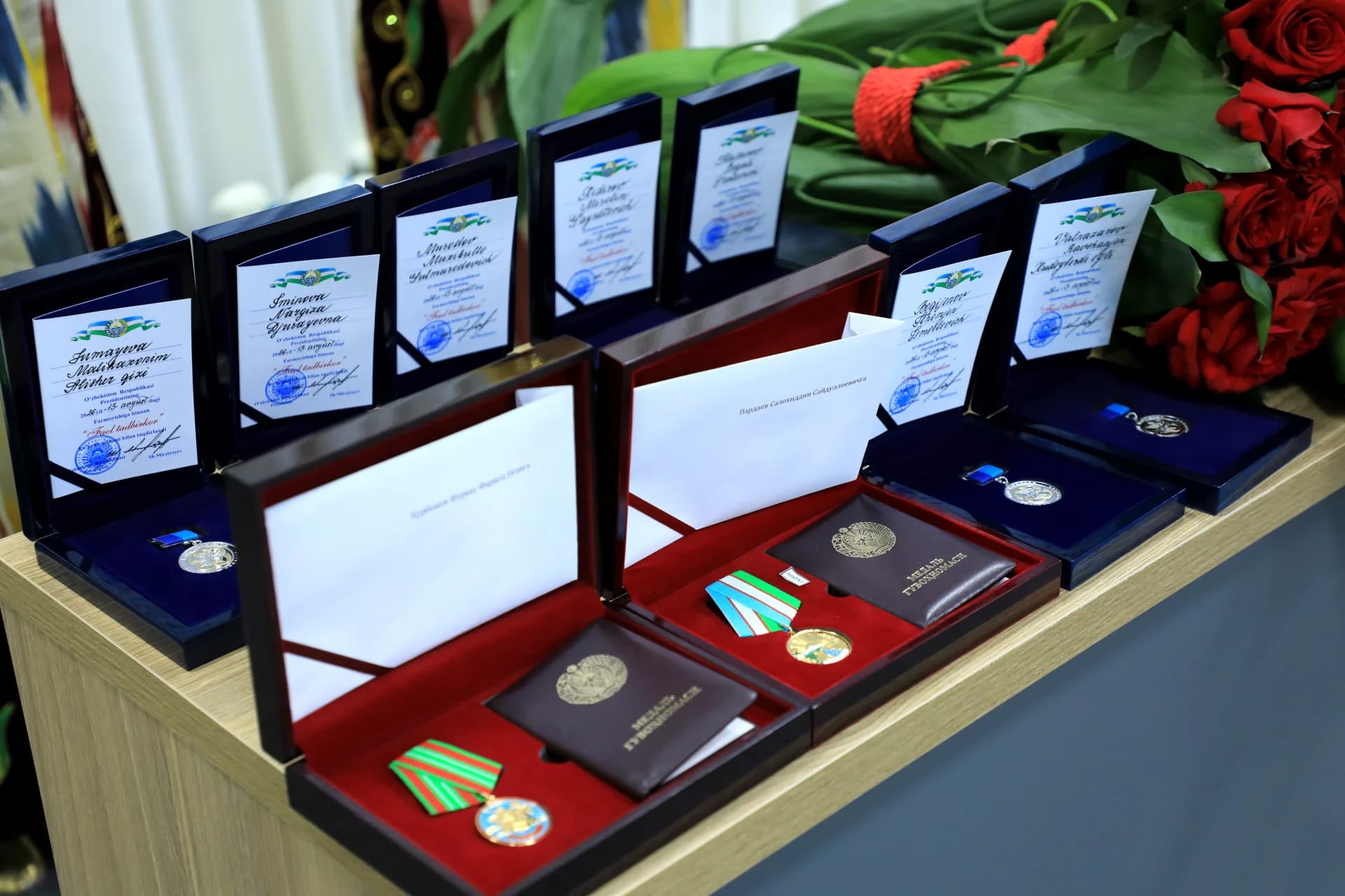 State awards and certificates arranged on a table