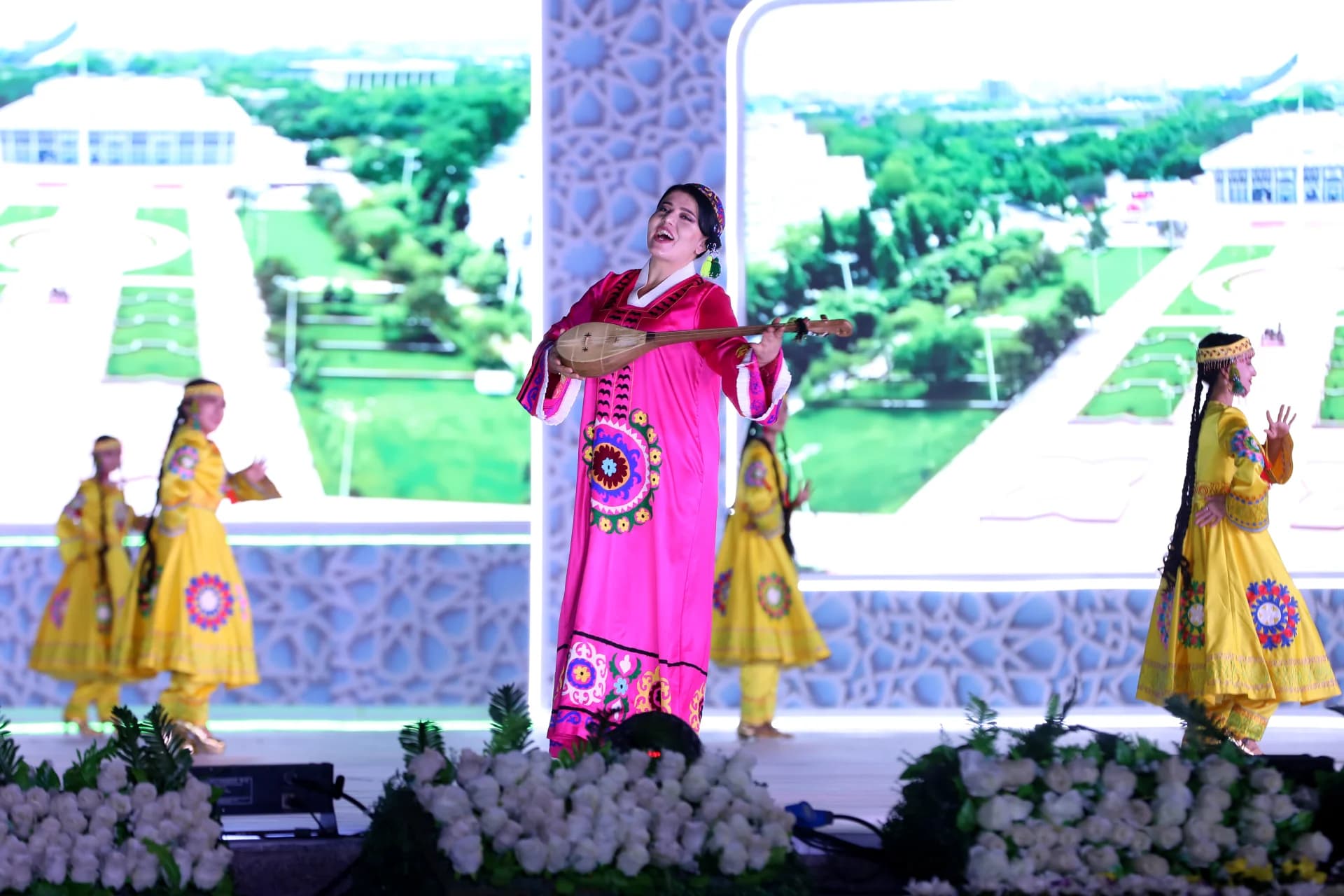 Performers in traditional clothing on stage