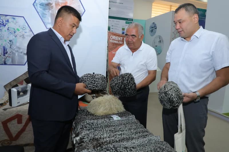 Men examine traditional fur hats