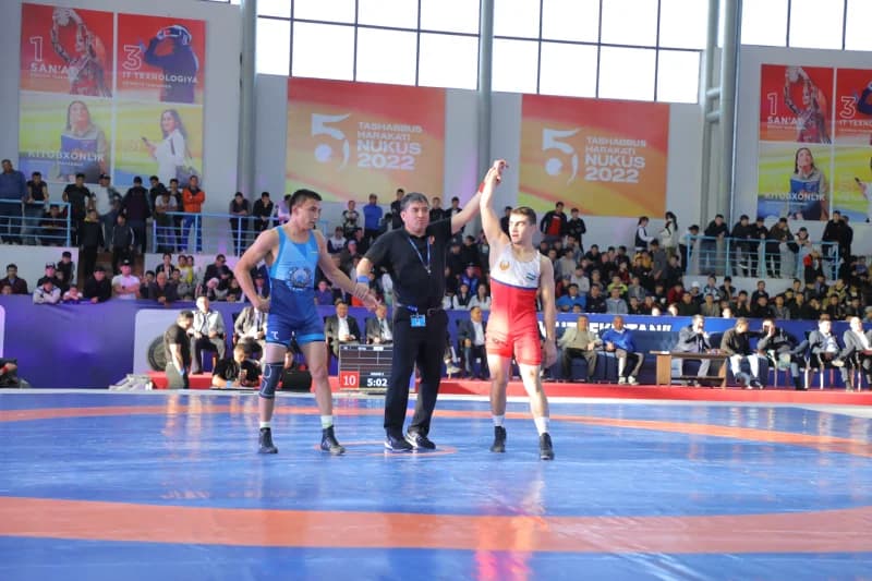 Referee declares winner of match