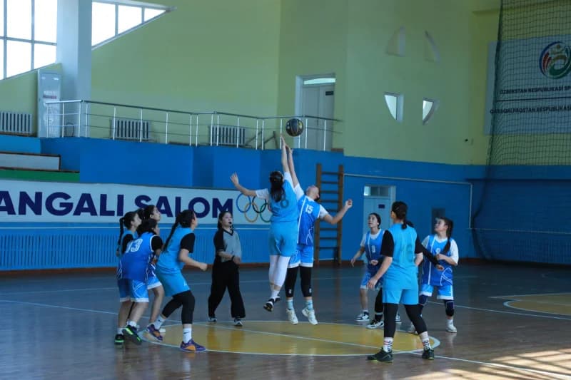 young athletes playing basketball match