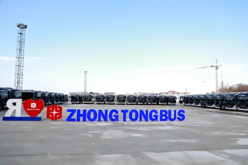 New buses parked outdoors