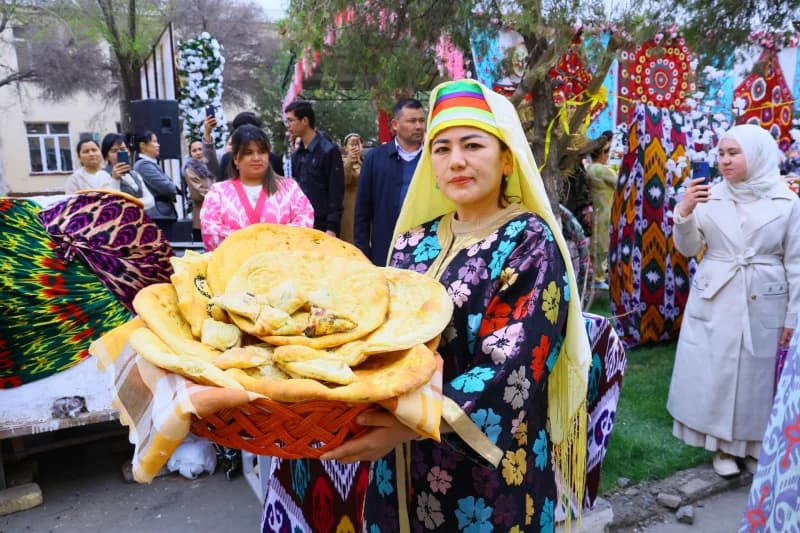 Woman holding traditional bread basket