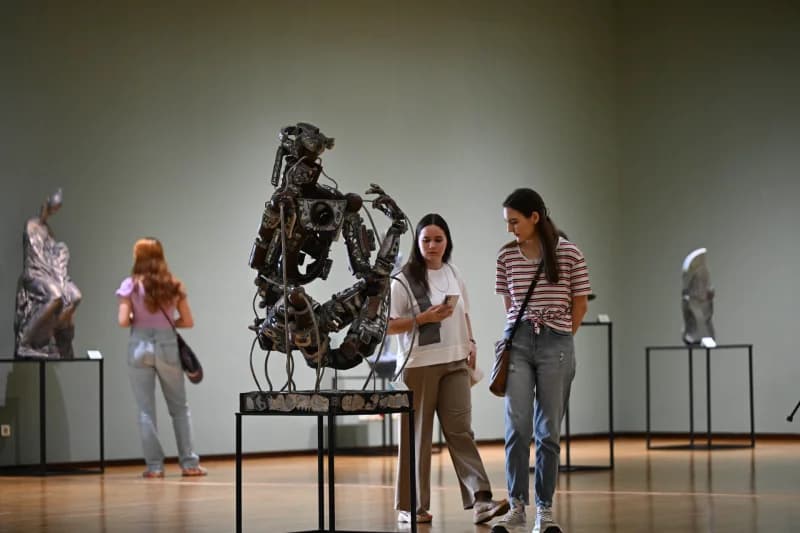 Visitors exploring modern art museum