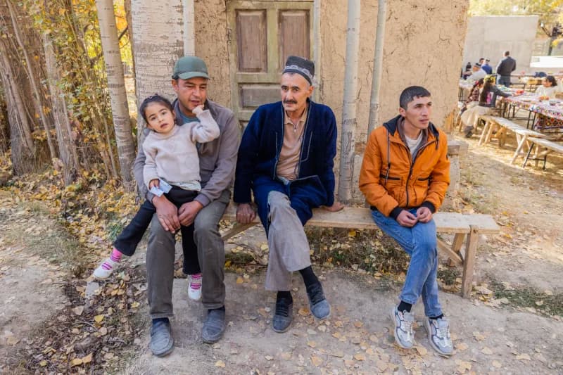People sitting on a bench outdoors