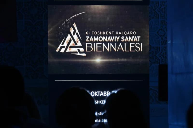 Screen displaying text in an indoor setting